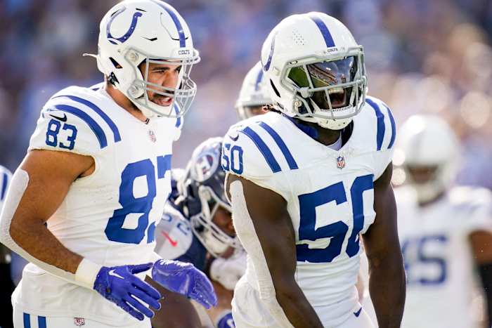Indianapolis Colts linebacker Segun Olubi (50) celebrates tackling Tennessee Titans running back Tyjae Spears during the first quarter at Nissan Stadium in Nashville, Tenn., Sunday, Dec. 3, 2023.
